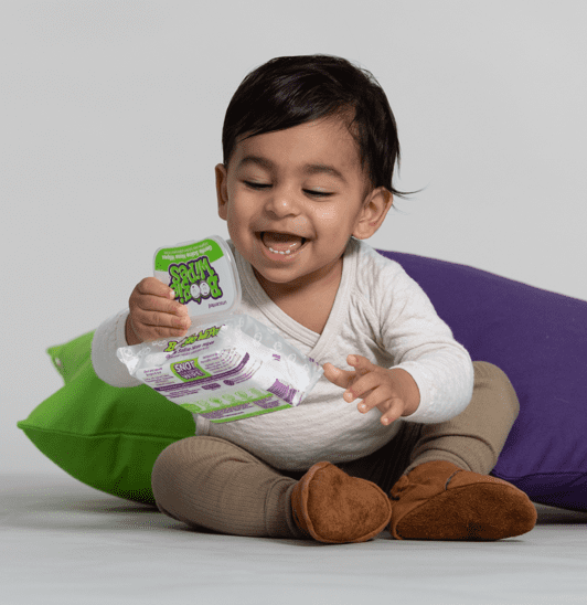 Kid playing with boogie wipes